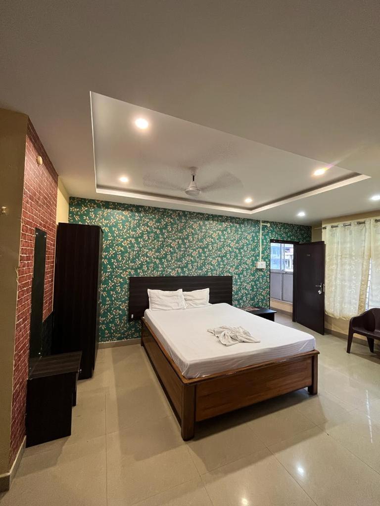 Hk Residency Hotel Guwahati Bagian luar foto